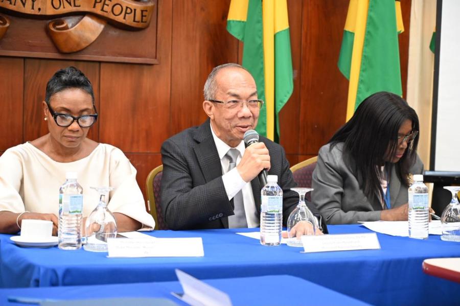 Deputy Prime Minister and Minister of National Security and Peace, Hon. Dr. Horace Chang (centre) addresses the quarterly meeting of the Citizen Security Business Group on Friday (September 25) at the Office of the Prime Minister.
