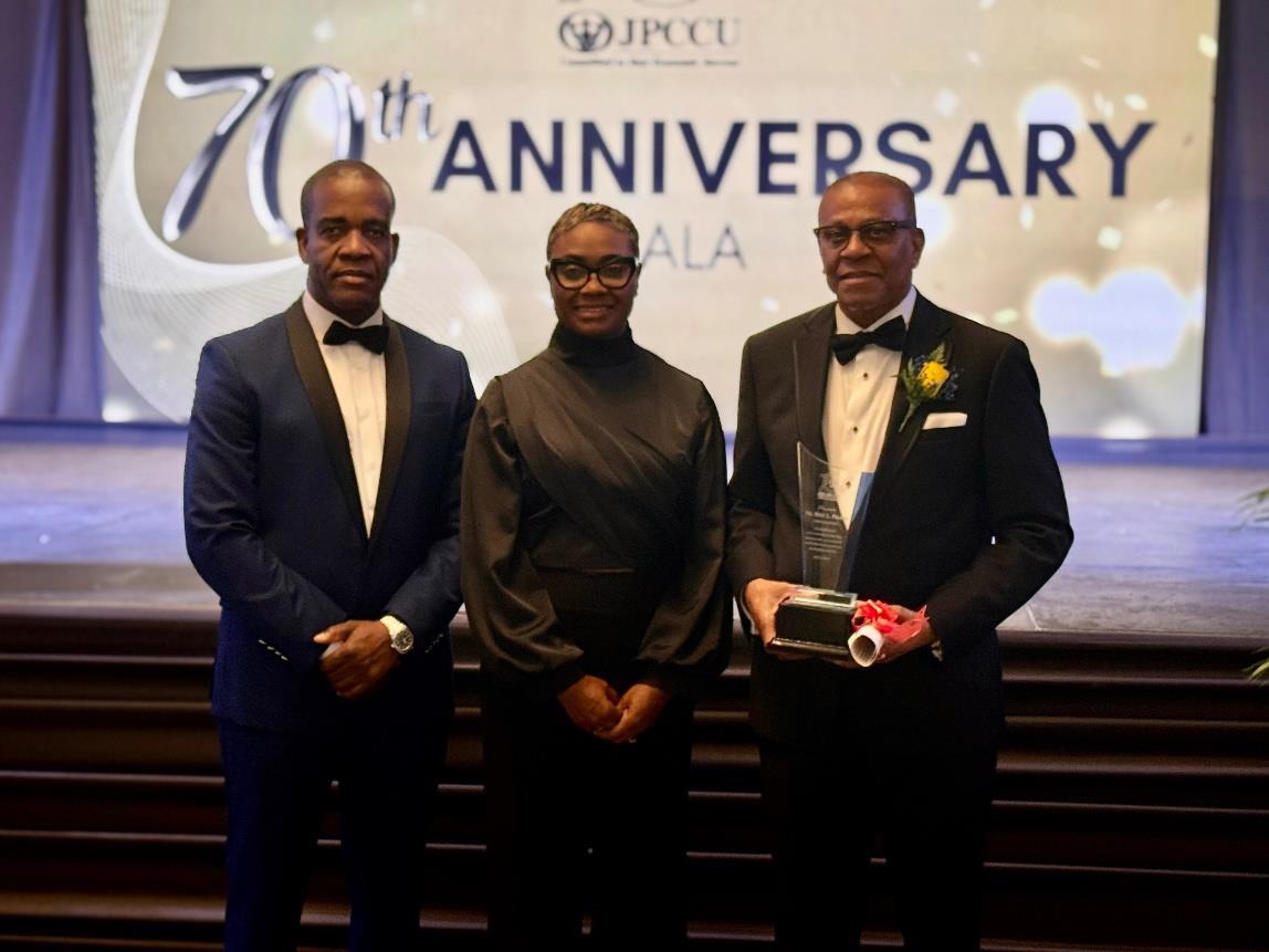 Minister of State in the Ministry of National Security, the Hon. Juliet Cuthbert-Flynn (centre) and Commissioner of Police, Dr. Kevin Blake (left) share a moment with General Manager of the Jamaica Police Co-operative Credit Union (JPCCU), Wray Palmer at the JPCCU’s 70th Anniversary Celebration held at the Jamaica Pegasus Hotel on Saturday (July 5).