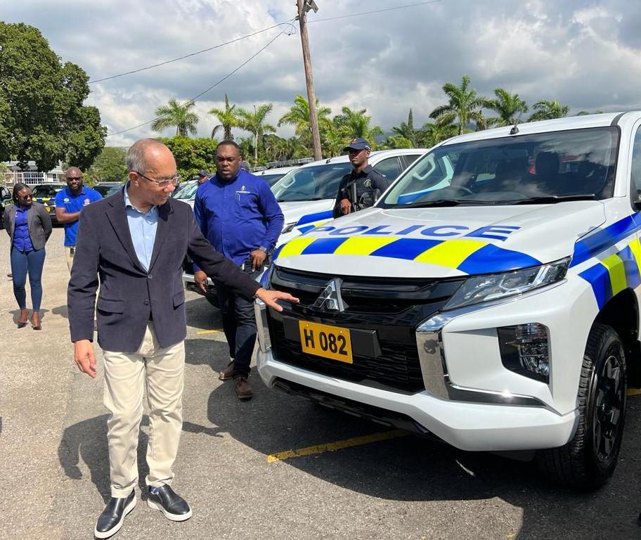 Deputy Prime Minister and Minister of National Security, the Hon. Dr. Horace Chang inspects one of thirty (30) L-200 pickups handed over to the Jamaica Constabulary Force (JCF). The handing over ceremony for the vehicles valued at over $230 million was held at the Office of the Commissioner of Police in Kingston today (January 19).
