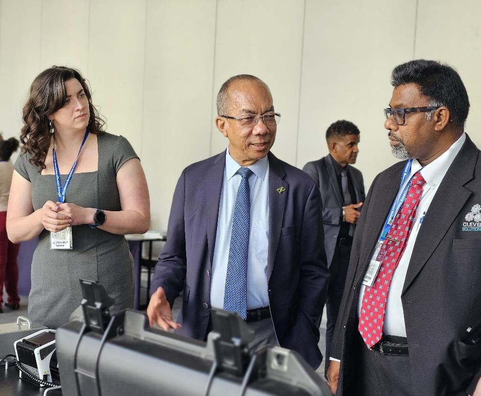 Deputy Prime Minister and Minister of National Security, the Hon. Dr. Horace Chang in conversation with Clive Bickram (right) and Calypso Harvey, representatives of Clever Solutions at the Caribbean Association of Forensic Sciences (CAFS) Conference held at the AC Marriott Hotel from June 10-12. The event serves as an avenue to explore the latest advancements in forensic science and crime-fighting technologies with the goal of improving evidence collection and analysis, enhancing investigative procedures, a