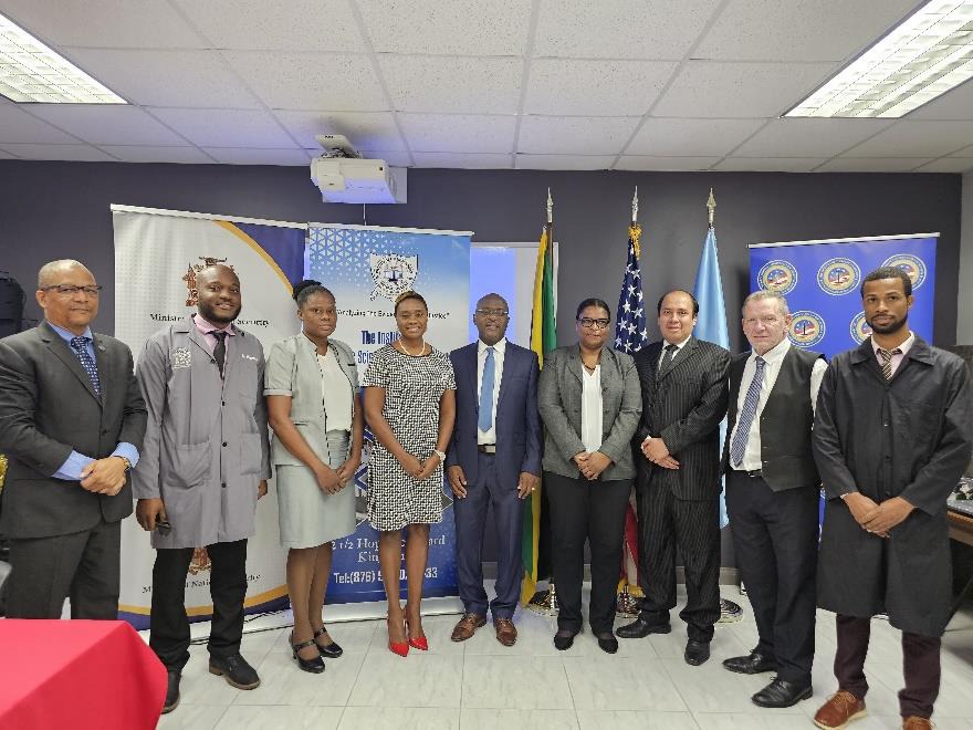 Minister of State in the Ministry of National Security, the Hon. Juliet Cuthbert-Flynn (fourth-left), Chief Executive Officer at the Firearm Licensing Authority, Shane Dalling (centre), Embassy of the United States of America representative, Dahlia Davis (third-left), Executive Director of the Institute of Forensic Science and Legal Medicine Dr. Judith Mowatt (fourth-right) and other participants pose at the launch for the Firearms Marking Workshop earlier today (April 16). The three-day workshop which is b