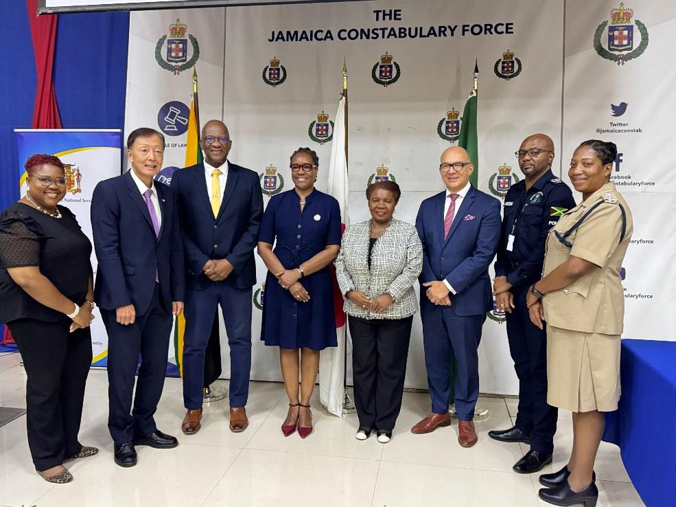 th Permanent Secretary in the Ministry of National Security and Peace, Ambassador Alison Stone Roofe (4 left), joined by Japan Ambassador nd rd to Jamaica, His Excellency, Yasuhiro Atsumi (2 left), Chargé d’Affaires of the Embassy of Brazil in Kingston, Antonio Ricarte (3 right), with stakeholder representatives from the Ministry of National Security and Peace, the Ministry of Foreign Affairs and Foreign Trade, the Jamaica Constabulary Force and the Independent Commission of Investigations, for a group phot