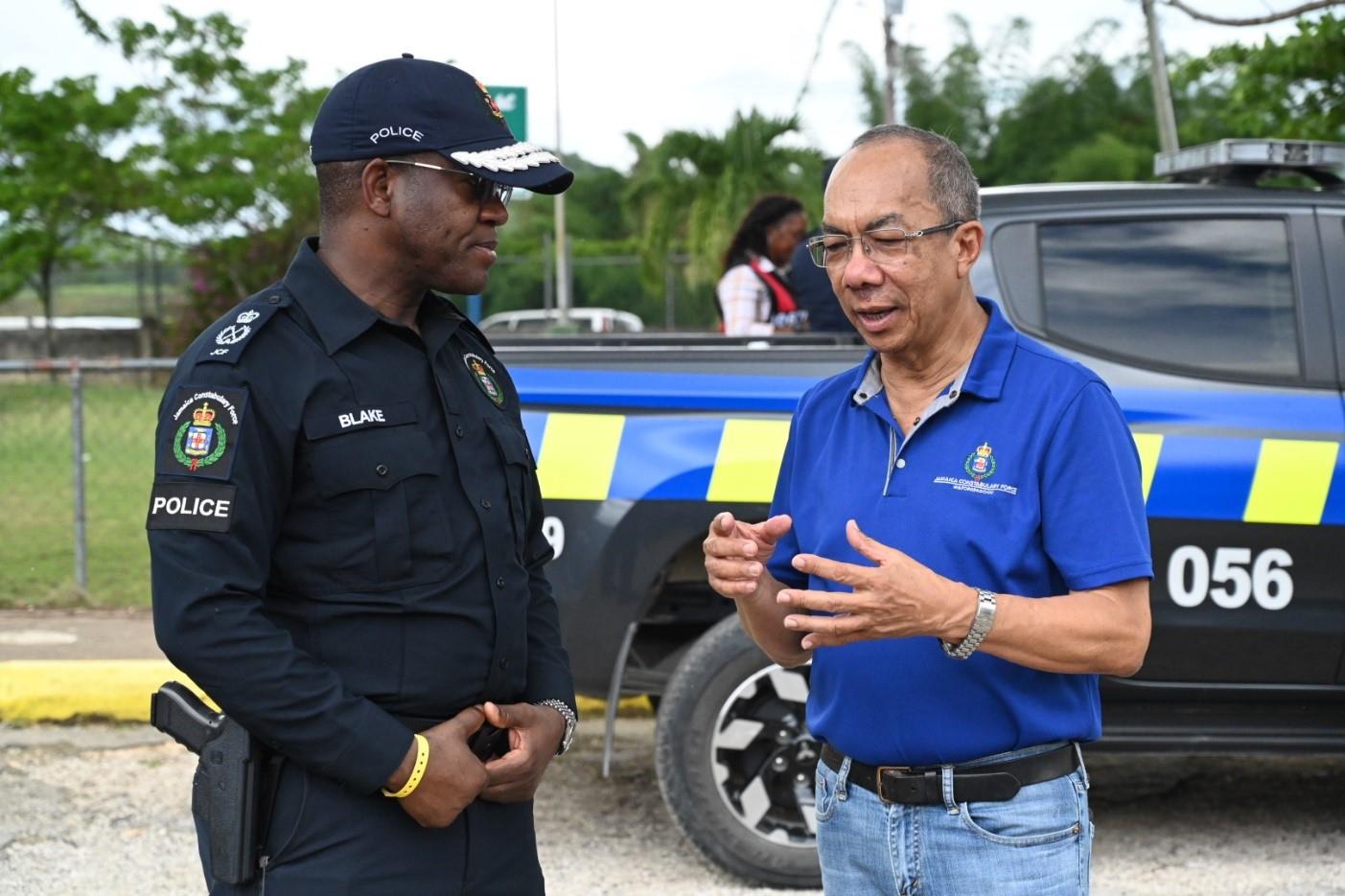 Deputy Prime Minister and Minister of National Security, the Hon. Dr. Horace Chang (right) has the attention of newly appointed Commissioner of Police Dr. Kevin Blake, during a tour of police facilities in Westmoreland and St James, earlier this year.