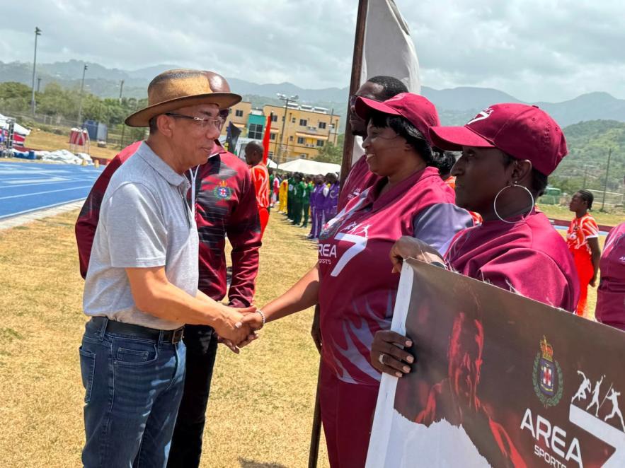 Deputy Prime Minister and Minister of National Security and Peace, the Hon. Dr. Horace Chang greets members of the Area 7 Team at the Jamaica Constabulary Force National Sports 2026 held on Saturday (May 30) at the UWI, Mona Bowl in Kingston.