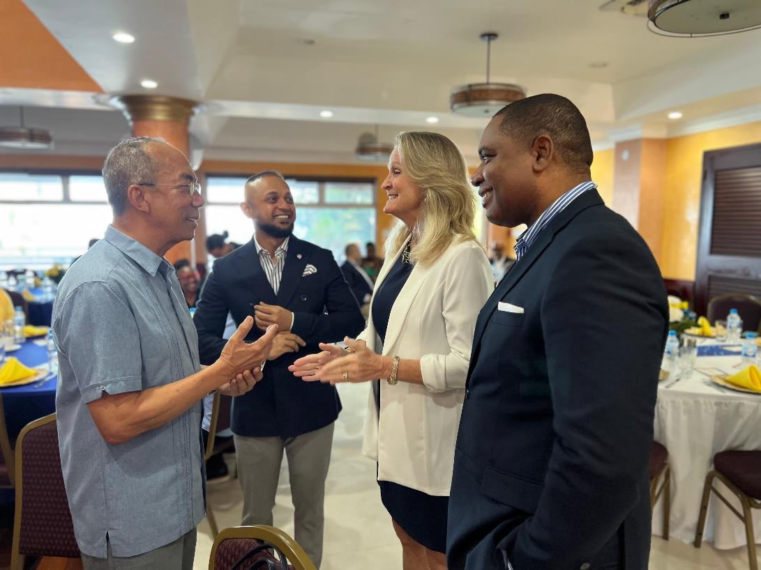 Deputy Prime Minister and Minister of National Security, the Hon. Dr. Horace Chang (left), Corporate Secretary, Linda Langford (second right), President, Anand Biradar (second left), and Director, Don Gittens of the Global Services Association of Jamaica engage in a discussion at the Global Services Association of Jamaica President’s Breakfast Forum held at the Grand-A-View Restaurant and Event Place in Montego Bay, St. James, today (February 29).