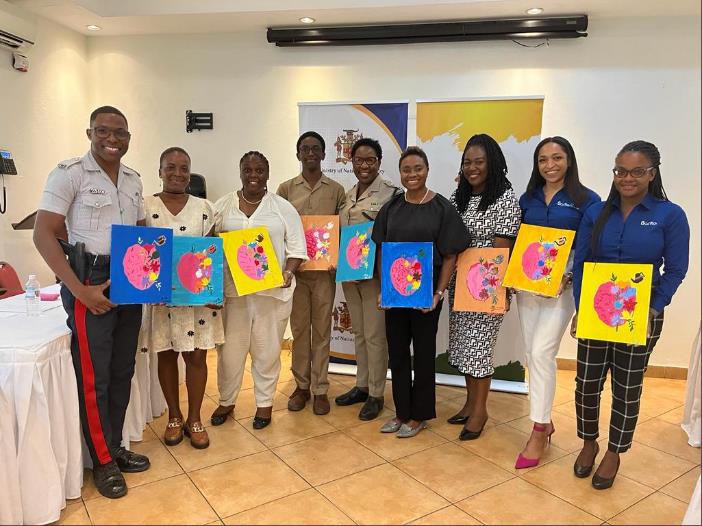 Minister of State in the Ministry of National Security Hon. Juliet Cuthbert-Flynn, Deputy Superintendent of Police for the St. James Division Angela McIntosh-Gayle, Managing Director of the Ace Institute Mrs. Larkin Wynter-Nedrick and other patrons at the Paint for Mental Health Workshop hosted at the Altamont West Hotel in St. James on October 10.