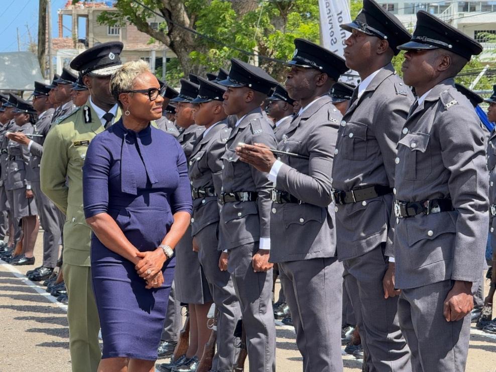 Minister of State in the Ministry of National Security, the Hon. Juliet Cuthbert-Flynn inspects the 114 new Correctional Officers of the 85th Intake at the Department of Correctional Services Passing Out Parade and Awards Ceremony held on Friday (May 9) at the Carl Rattray Staff College in Runaway Bay St. Ann.