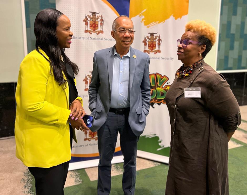 Deputy Prime Minister and Minister of National Security, the Hon. Dr. Horace Chang engages in a conversation with Permanent Secretary in the Ministry of Education and Youth, Dr. Kasan Troupe (left) and Executive Director of the Citizen Security Secretariat, Dianne McIntosh at the Inter-Ministerial School Support Retreat on a Multi-Agency Response to Violence in Schools in Western Jamaica at the Iberostar Rose Hall Hotel in Montego Bay, St. James. The Retreat focused on sharing data and strategies to tackle 
