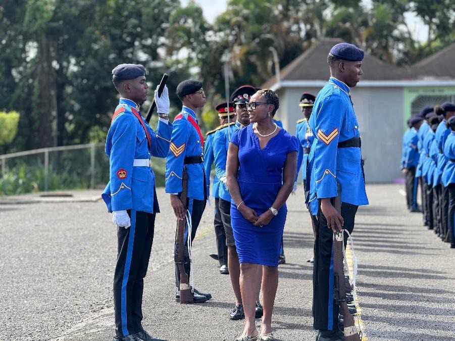 Minister of State in the Ministry of National Security, the Hon. Juliet Cuthbert-Flynn inspects members of the St. Mary High School cadet unit at during the Reuel Vaz Trophy Parade and Presentation Ceremony held yesterday (June 30) at the institution. St. Mary High emerged as the champion in the Jamaica Combined Cadet Force’s Reuel Vaz Trophy Competition and has copped the trophy for the 18th year.
