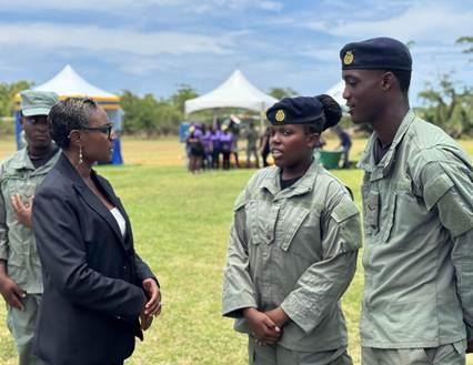 Minister of State in the Ministry of National Security, the Hon. Juliet Cuthbert-Flynn (left) in conversation with Cadets at the Jamaica Combined Cadet Force Annual Camp 2025 Open Day held at the William Knibb Memorial High School on Sunday (July 20) in Trelawny.