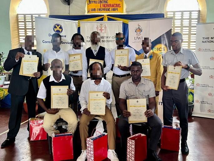 The eight Inmates and the two Correctional Officers who completed the programme displaying their Certificates in Entertainment Business from the University of the West Indies Mona at the UWI Mona Prison Project graduation ceremony at Tower Street Adult Correctional Centre Chapel on Tuesday August 22. (The 10 Graduates)