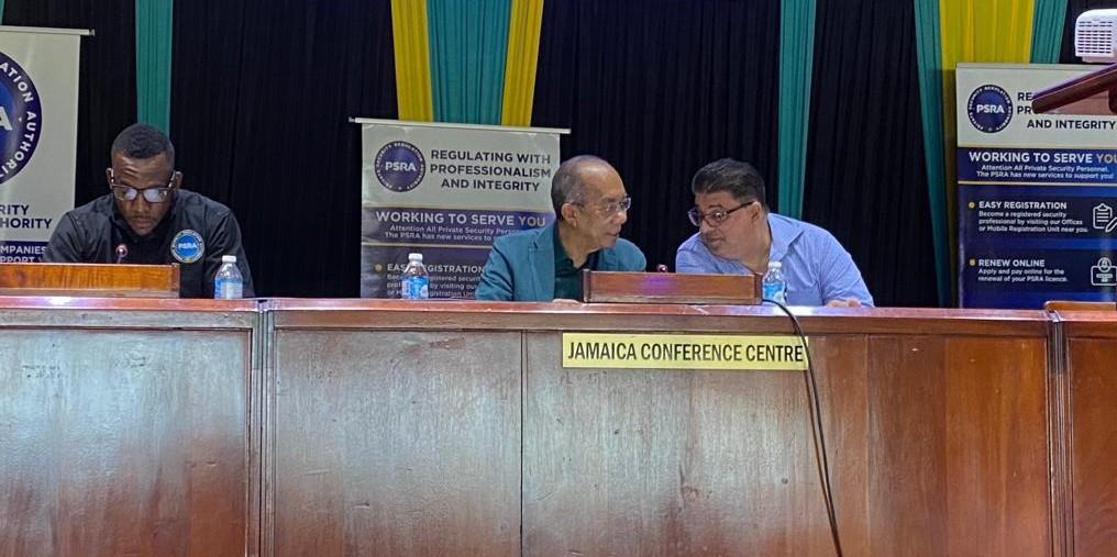 Deputy Prime Minister and Minister of National Security, the Hon. Dr. Horace Chang converses with Chairman of the Private Security Regulation Authority (PSRA), Mr. Joseph Issa, at the PSRA Annual Conference held at the Jamaica Conference Centre on Saturday, September 23, 2023. The Executive Director of the PSRA, Mr. Rick Harris was also in attendance.