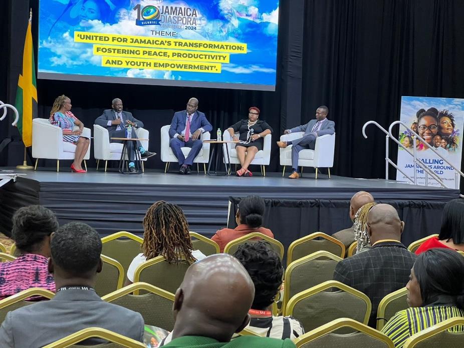 Deputy Commissioner of Police, Fitz Bailey (centre), Chief Technical Directors in the Ministry of National Security, Shauna Trowers and Delroy Simpson (first right), Moderator of the panel, Head of Corporate Services Division, Ministry of National Security, Elaine Oxamendi-Vicet (first left) and Sector Lead for Citizen Security, Global Jamaica Diaspora Council, Kevin Junor participate in a panel discussion at the 10th Biennial Diaspora Conference at the Montego Bay Convention Centre in St. James.