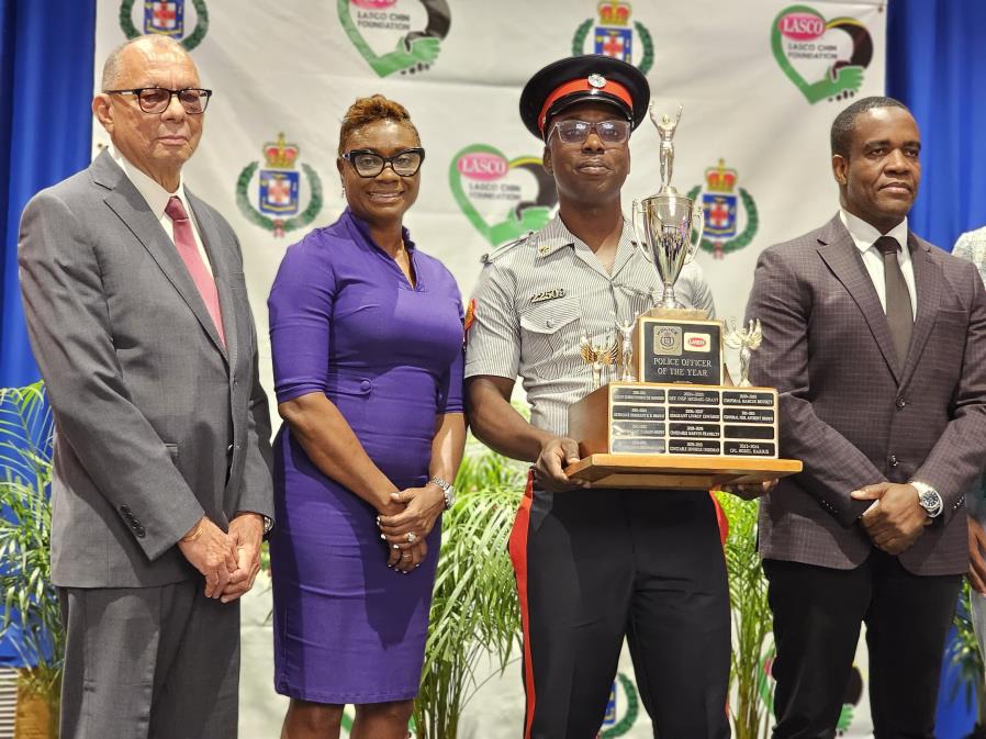 Minister of State in the Ministry of National Security, the Hon. Juliet Cuthbert-Flynn shares a moment with Commissioner of Police, Dr. Kevin Blake (right), Executive Chairman of the LASCO Affiliated Companies, James Rawle and the Top Cop Award recipient, Corporal Junior Thompson from the Area 5 Police Division, at the LASCO/Jamaica Constabulary Force Saluting Our Heroes Awards Ceremony earlier today (October 25). The event was held at the Jamaica Pegasus Hotel in Kingston. One hundred and fifty-seven offic