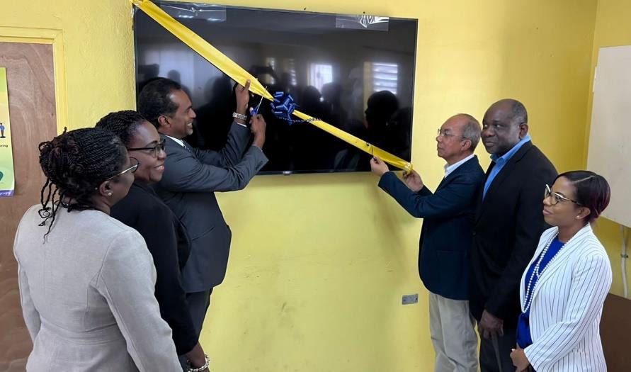 Caption: Deputy Prime Minister and Minister of National Security, the Hon. Dr. Horace Chang and Executive Director of the Tourism