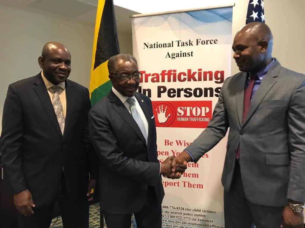 US Ambassador to Jamaica, His Excellency Nick Perry and is joined by Chairman of the National Task Force Against Trafficking in Person (NATFATIP) and Permanent Secretary in the Ministry of National Security, Mr. Courtney Williams at the US-Jamaica Child Protection Compact Partnership third Bilateral Dialogue at the Courtyard by Marriott hotel in Kingston on Wednesday (July 13, 2022).