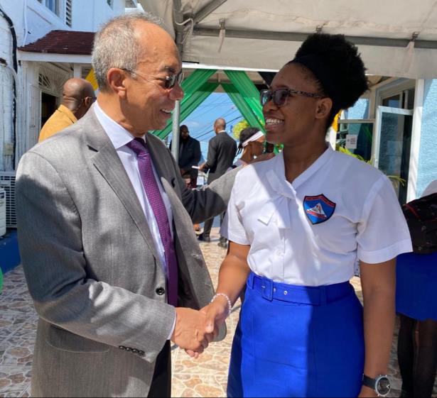 Deputy Prime Minister and Minister of National Security, the Hon. Dr. Horace Chang greets Juanita Nelson, a student of Sam Sharpe Teachers’ College during his visit at the institution’s Research Day held in Montego Bay, St. James on Wednesday (February 28).