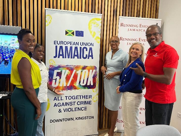 Minister of State in the Ministry of National Security, the Hon. Juliet Cuthbert-Flynn shares a moment with European Ambassador to Jamaica, Her Excellency Marianne Van Steen (second right), Minister of Education and Youth, the Hon. Fayval Williams (third right), Race Director for Running Events, Alfred “Frano” Francis and Olympic bronze medalist, Megan Tapper (second left) at the launch of the second staging of the European Union 5K/10K Run. The event was held at the European Union Delegation in Kingston ye